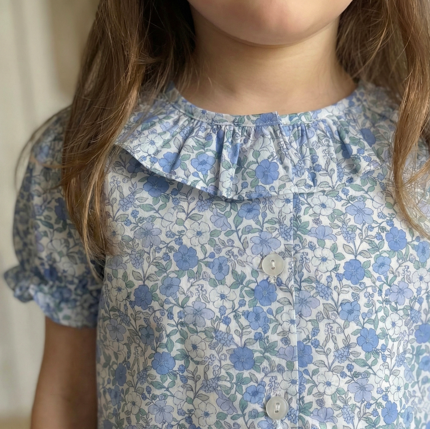 blue and green blouse