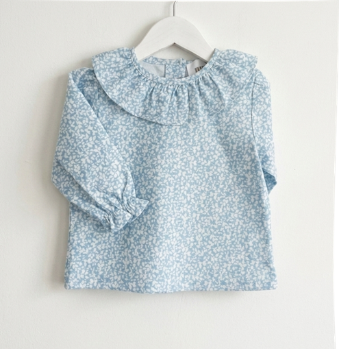 Blusa volante manga larga azul