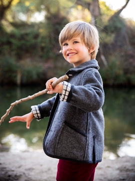 grey coat austrian boy