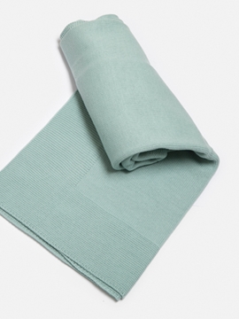 green knitted blanket